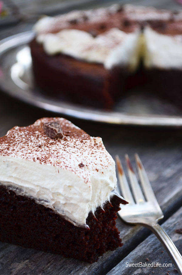 Bailey's Irish Cream Chocolate Cake includes a one-layer Bailey's chocolate cake, topped with Bailey's ganache and slathered with Bailey's whipped cream! | Sweet Baked Life
