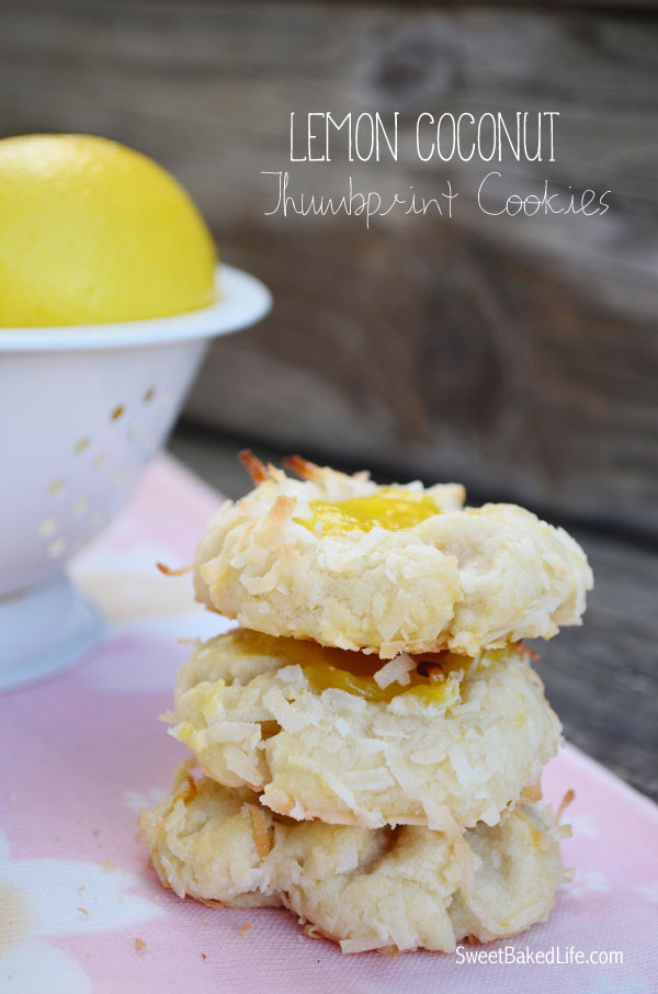 Jump into spring with these tasty Lemon Coconut Thumprint Cookies. Includes a simple homemade lemon curd recipe too! | Sweet Baked Life