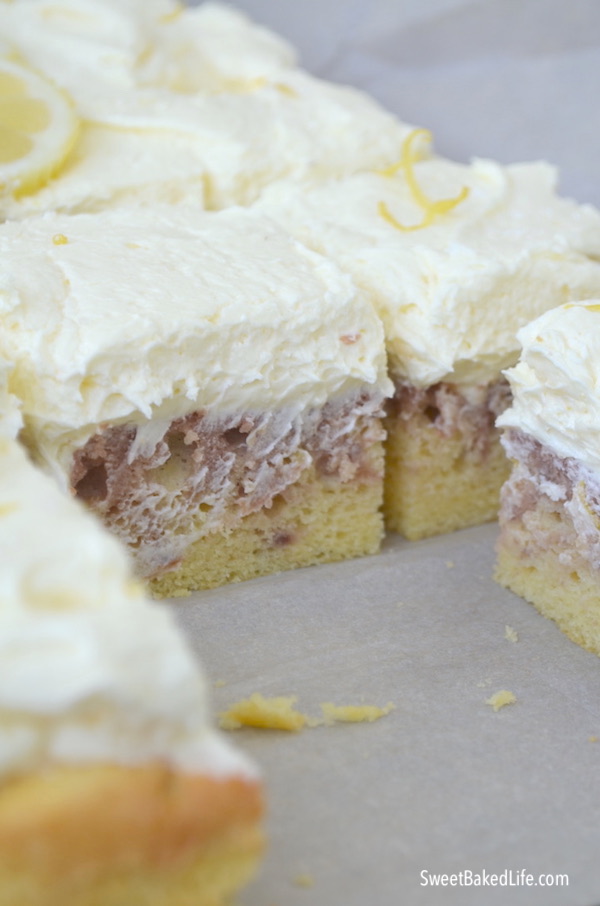 Lemon Raspberry Cake with tangy lemon buttercream frosting! @sweetbakedlife.com