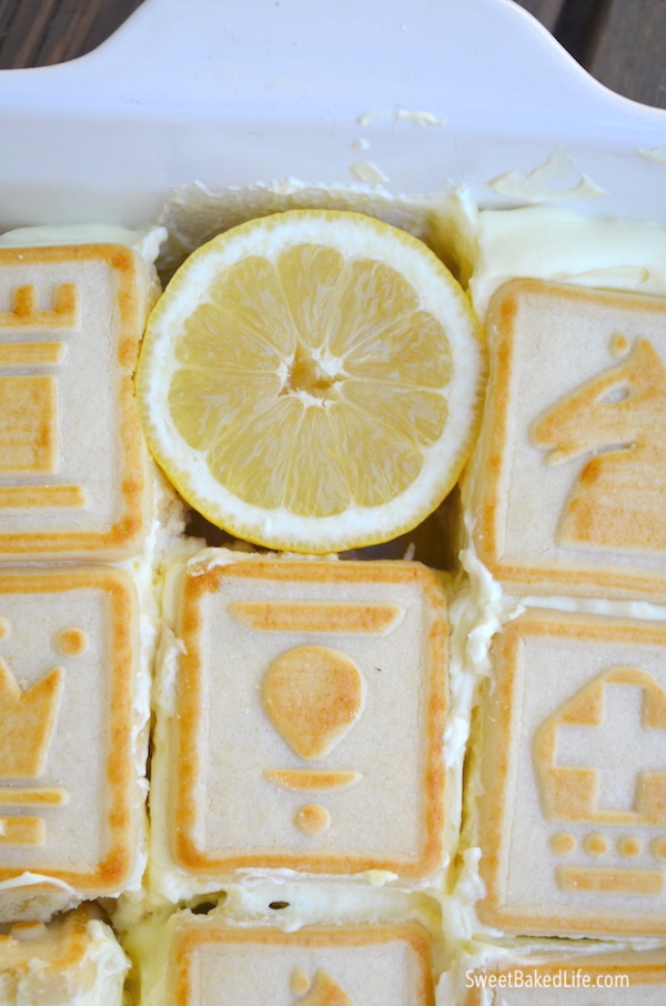 You've got to try this no-bake Lemon Layered Dessert @SweetBakedLife