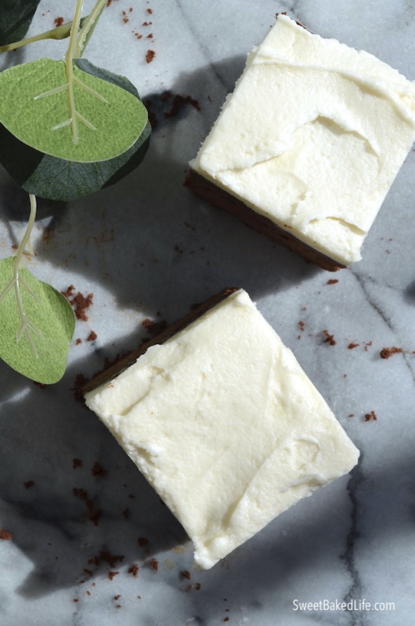 A cold chocolate snacking cake with creamy frosting both infused with the flavors of Baileys Irish cream. @sweetbakedlife