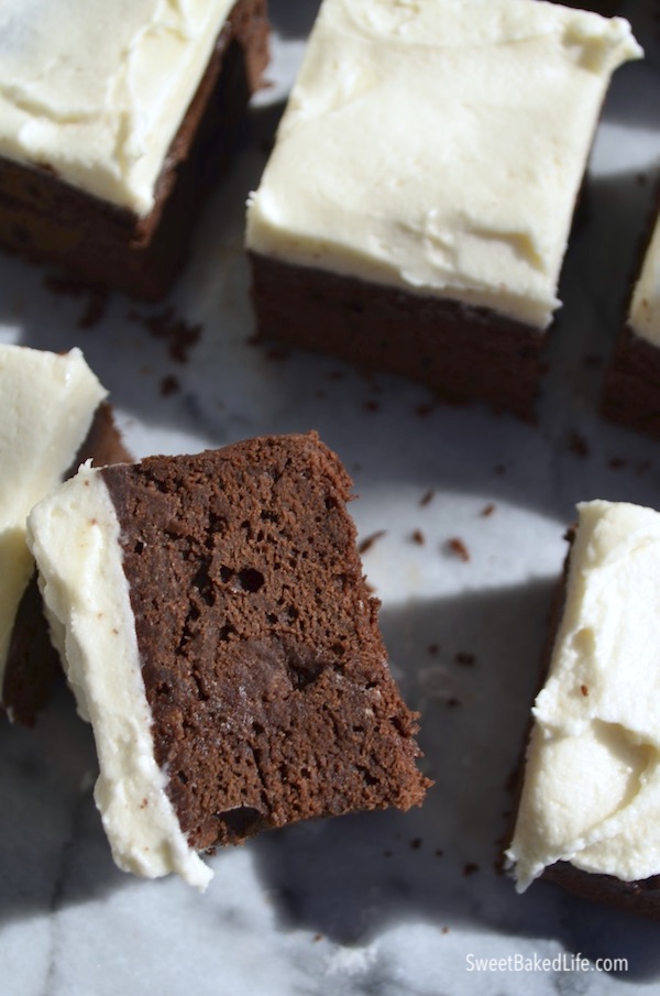 A cold chocolate snacking cake with creamy frosting both infused with the flavors of Baileys Irish cream. @sweetbakedlife